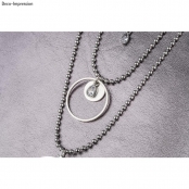 Breloque en métal et strass Goutte argent2 4,5x6,5mm 2 pièces