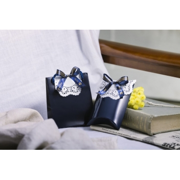 18700005 - 4977766770439 - Brother - Cartouche ruban Brother 12mm Tissu Doré sur bleu navy TZe-RN34 - 4