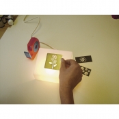 Tablette lumineuse pour embosser